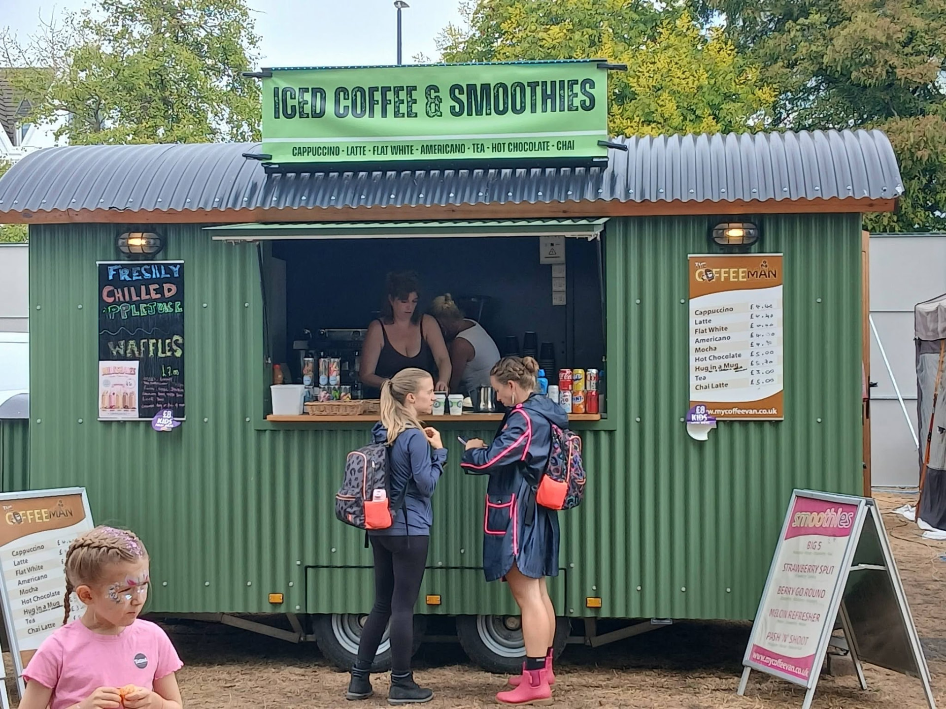 Mobile coffee van hire in Gloucester. The Coffee Man trailer serving customers at an event at dusk